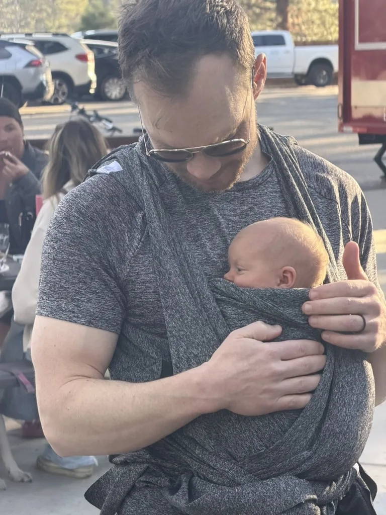 Grant McCracken holding his daughter, Ava